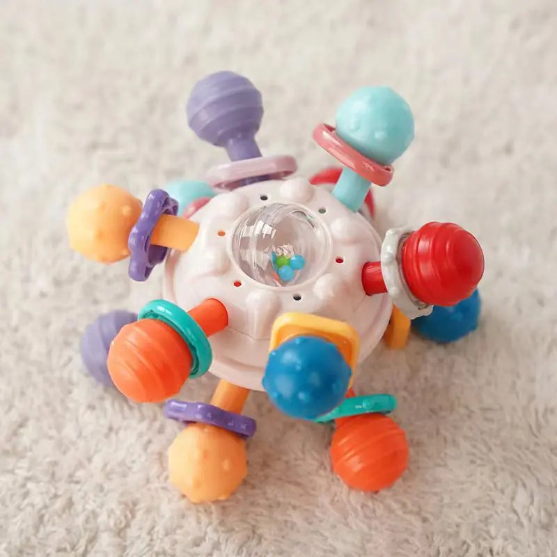 Rotating Rattle Ball Grasping