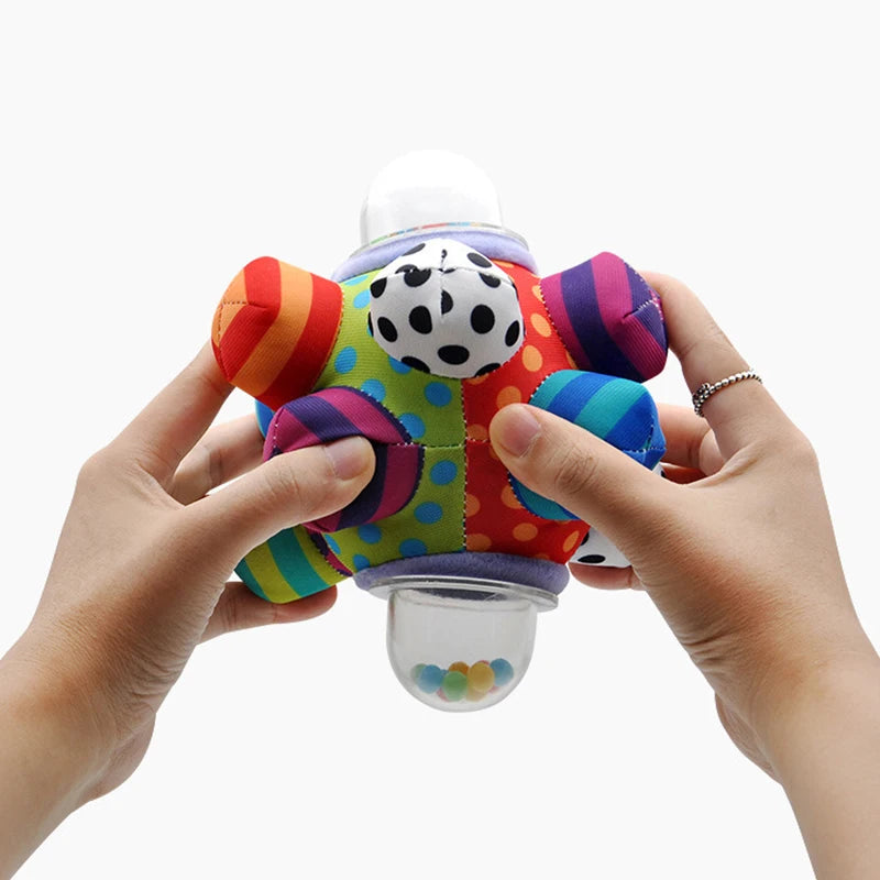 Rotating Rattle Ball Grasping